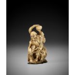 TOMOMASA: A SUPERB IVORY NETSUKE OF RAKAN HANDAKA SONJA CONJURING A DRAGON