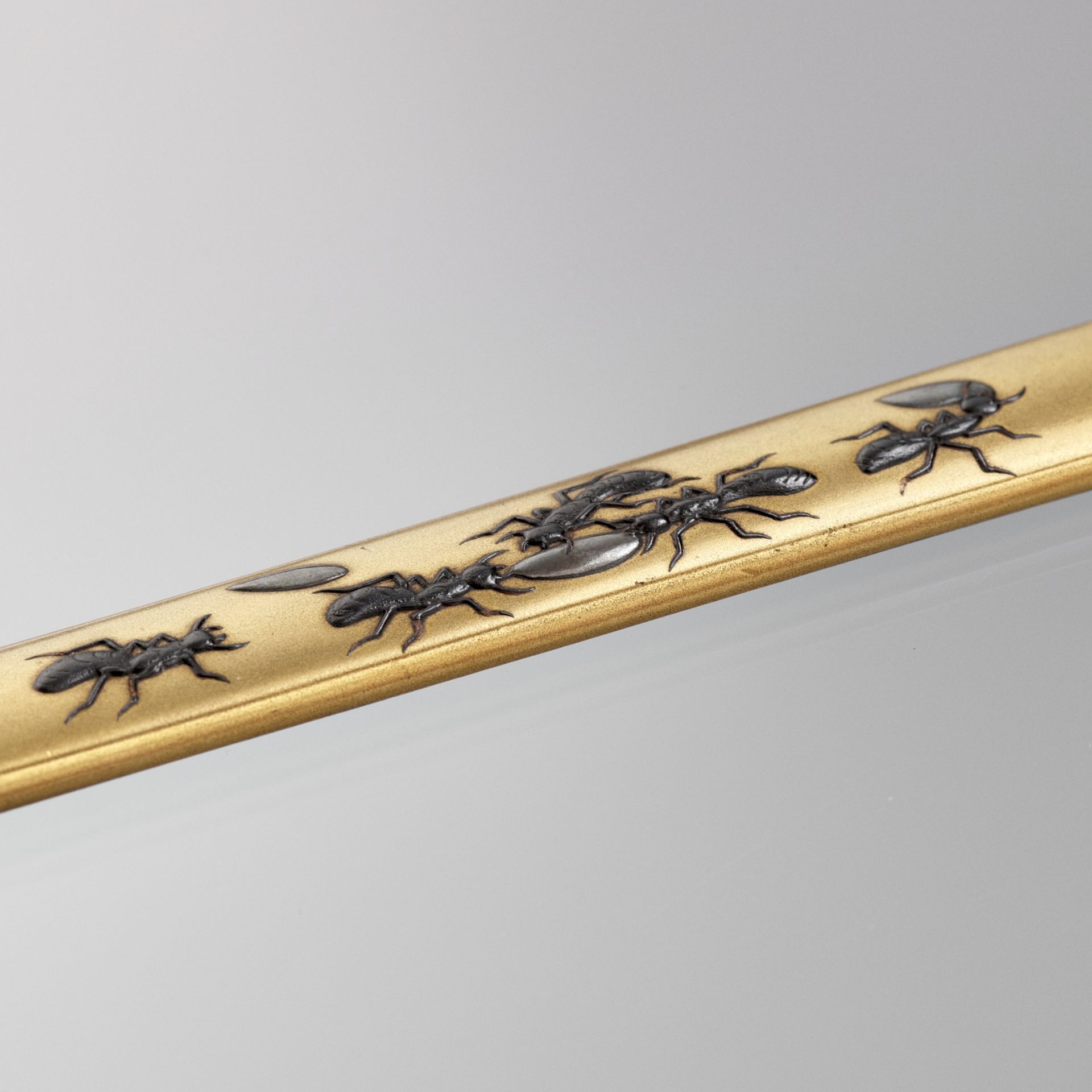 JOKA: A RARE LACQUERED METAL KOZUKA WITH ANTS