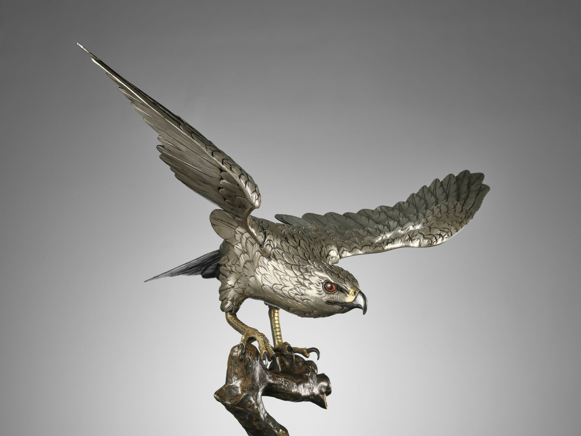 HANEHIRO: A FINE SILVERED BRONZE OKIMONO OF A HAWK - Bild 2 aus 15