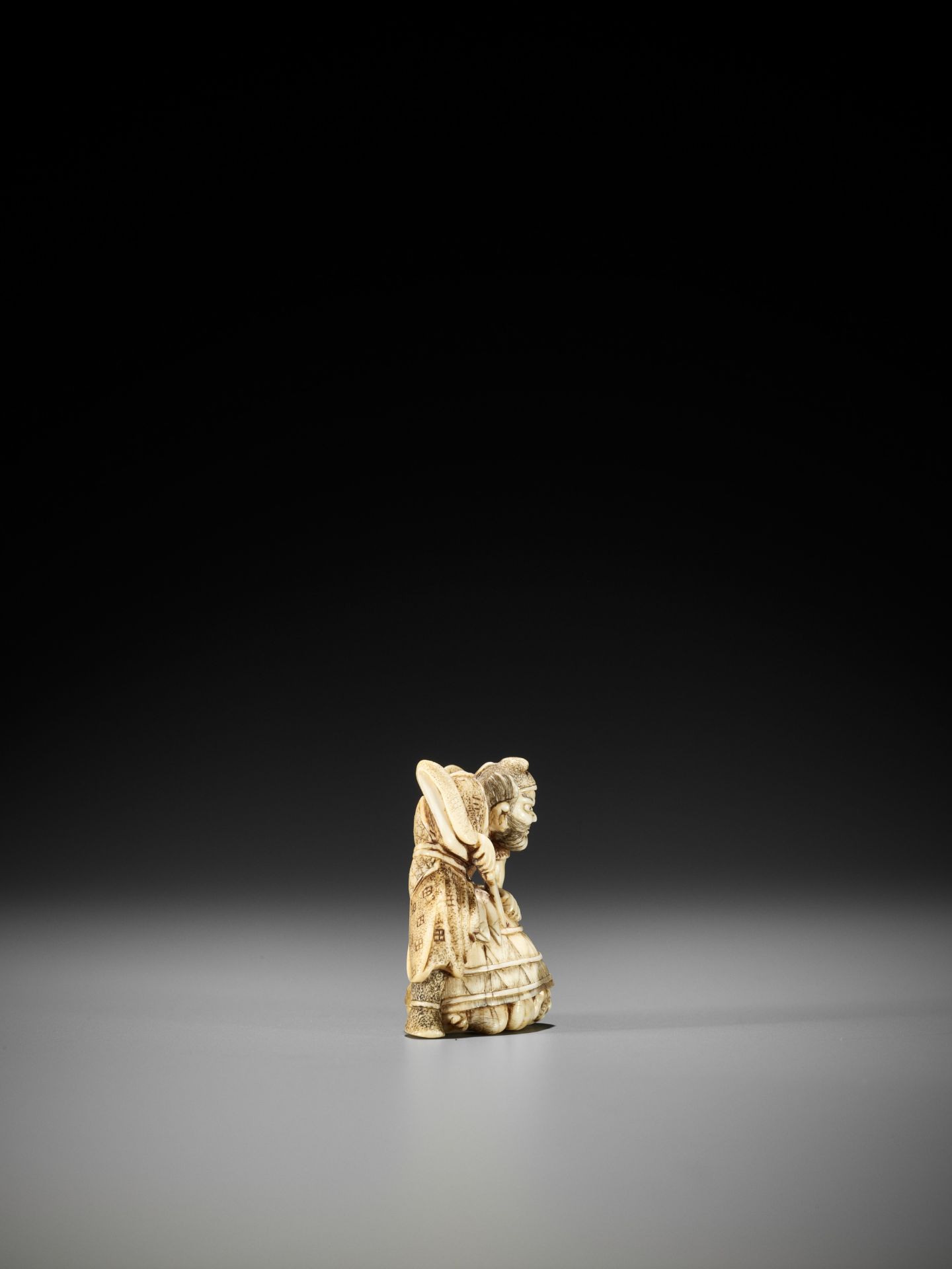 HIDEMASA: AN AMUSING IVORY NETSUKE OF SHOKI AND ONI - Image 7 of 10