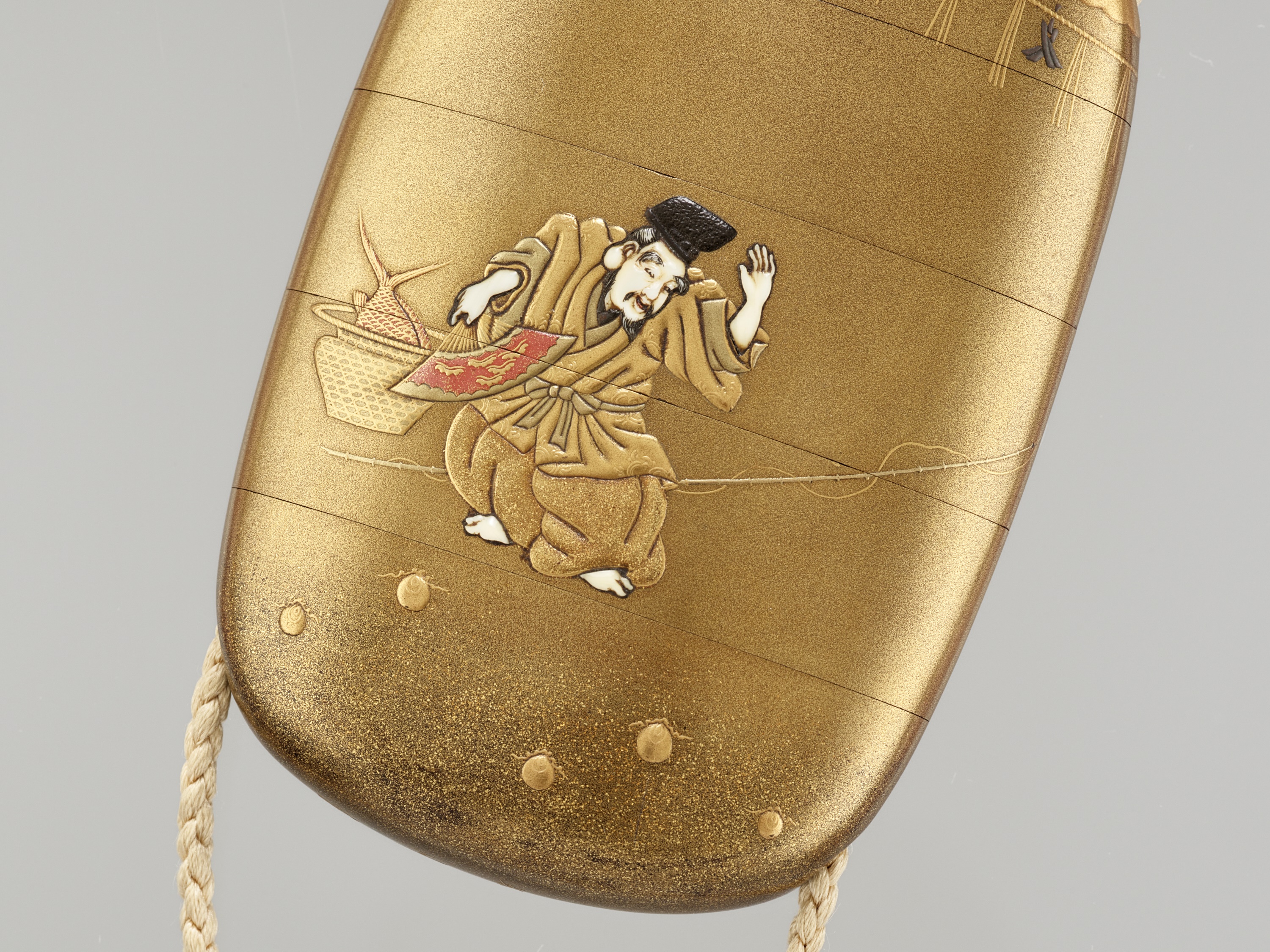 KAJIKAWA: A GOLD-LACQUER FOUR-CASE INRO DEPICTING EBISU AND DAIKOKU - Image 2 of 9
