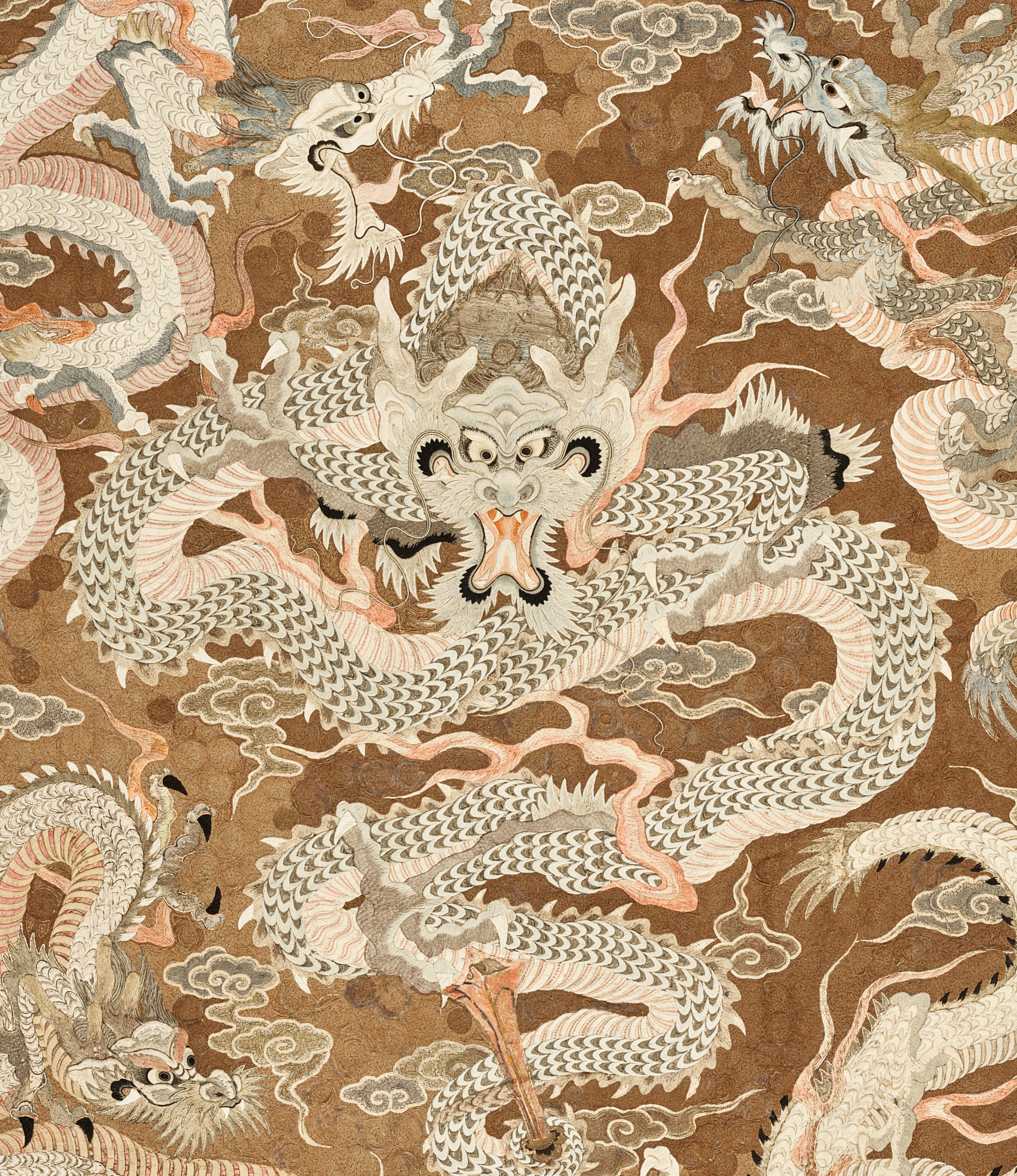 AN EXCEPTIONAL AND VERY LARGE SILK EMBROIDERED 'SEVEN DRAGON' WALL HANGING