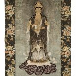 A RARE EMBROIDERED SILK WALL HANGING OF KANNON