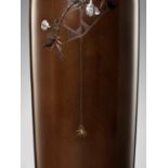 OTSUEI FOR THE NOGAWA COMPANY: A MASTERFUL INLAID BRONZE VASE OF A SPIDER HANGING FROM A PLUM BRANCH