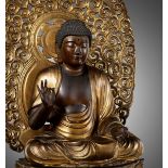 A LARGE GILT AND LACQUERED WOOD FIGURE OF AMIDA NYORAI