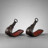 YOSHITSUGU: A PAIR OF GILT AND SILVER-INLAID LACQUERED IRON STIRRUPS (ABUMI)