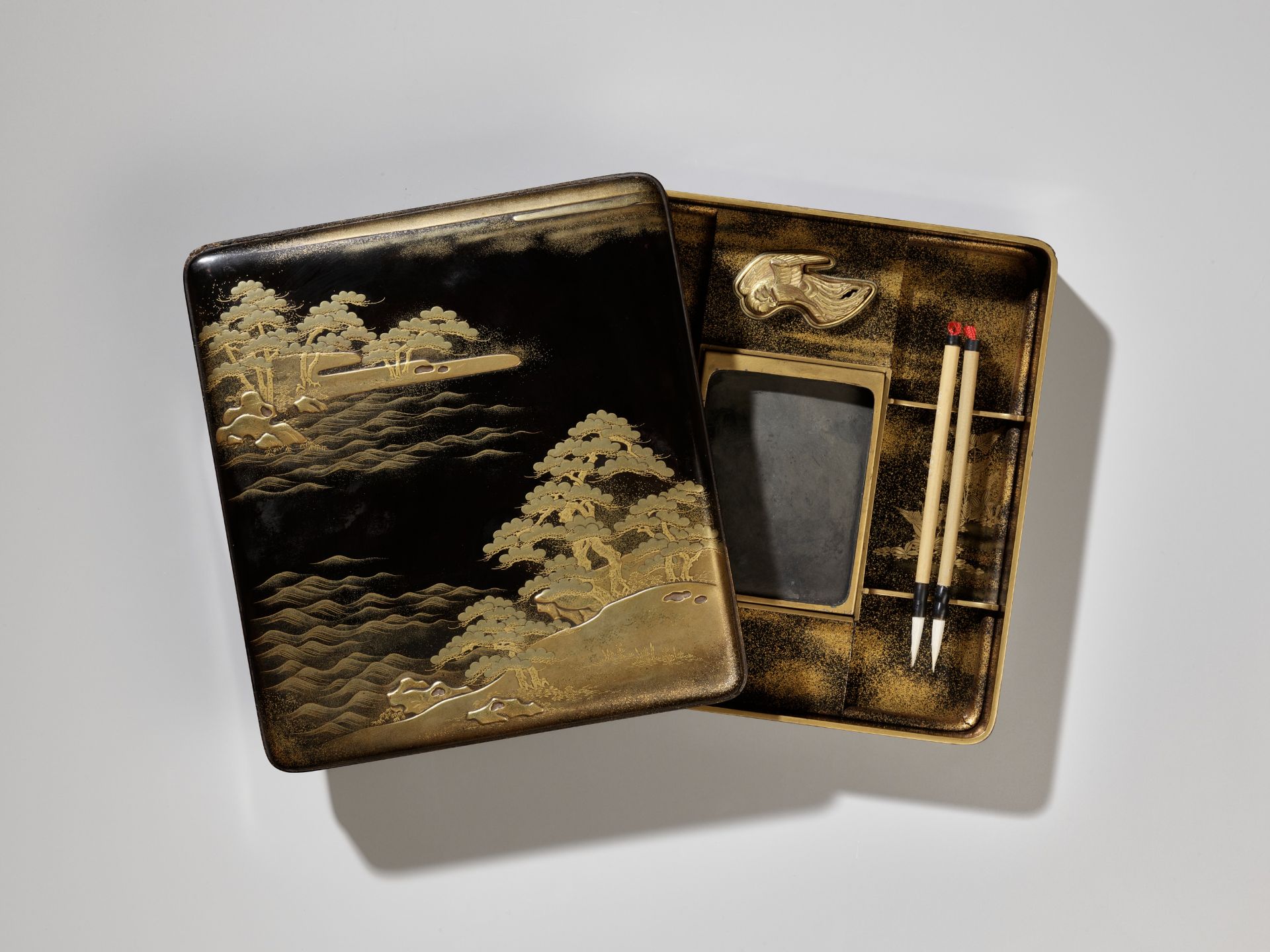 A BLACK AND GOLD LACQUER SUZURIBAKO WITH A SHORELINE LANDSCAPE AND RED-CRESTED CRANES - Image 6 of 15