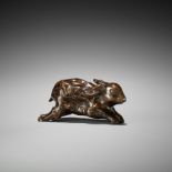 AN UNUSUAL ROOTWOOD OKIMONO OF A LEAPING HARE
