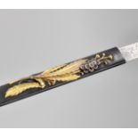 A GOLD AND SILVER-INLAID SHAKUDO KOZUKA WITH SIGNED BLADE