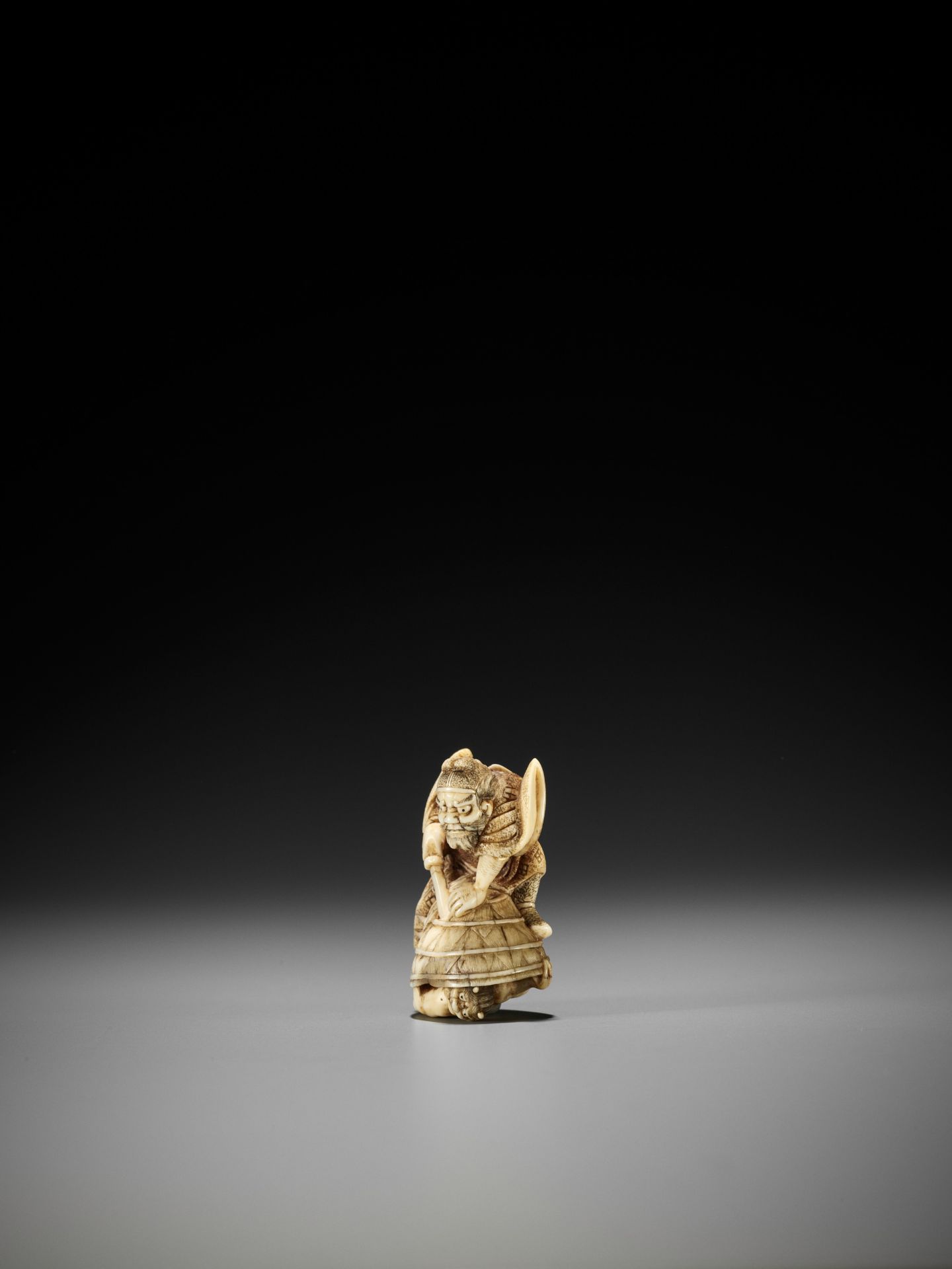 HIDEMASA: AN AMUSING IVORY NETSUKE OF SHOKI AND ONI - Image 5 of 10