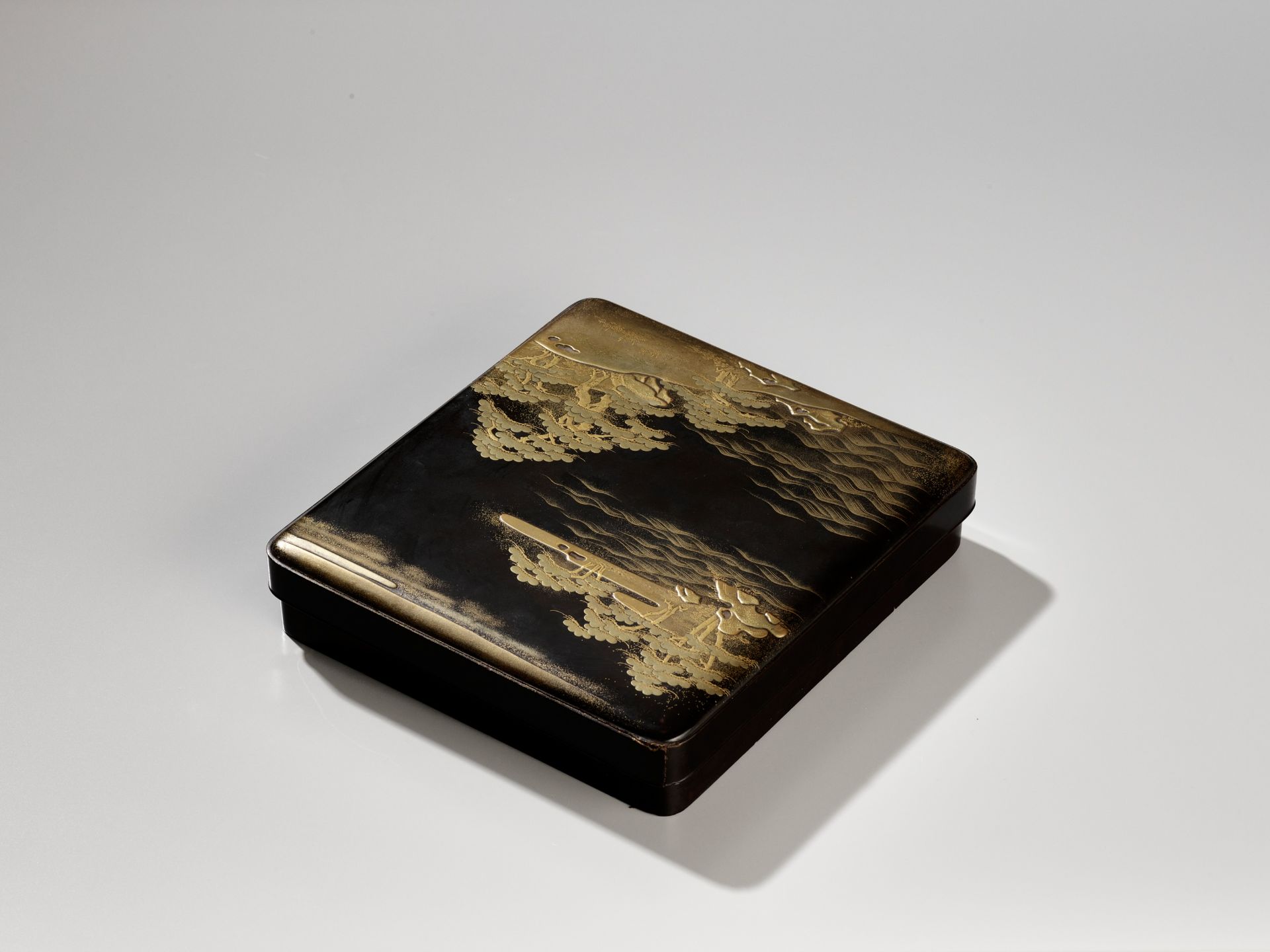 A BLACK AND GOLD LACQUER SUZURIBAKO WITH A SHORELINE LANDSCAPE AND RED-CRESTED CRANES - Image 12 of 15