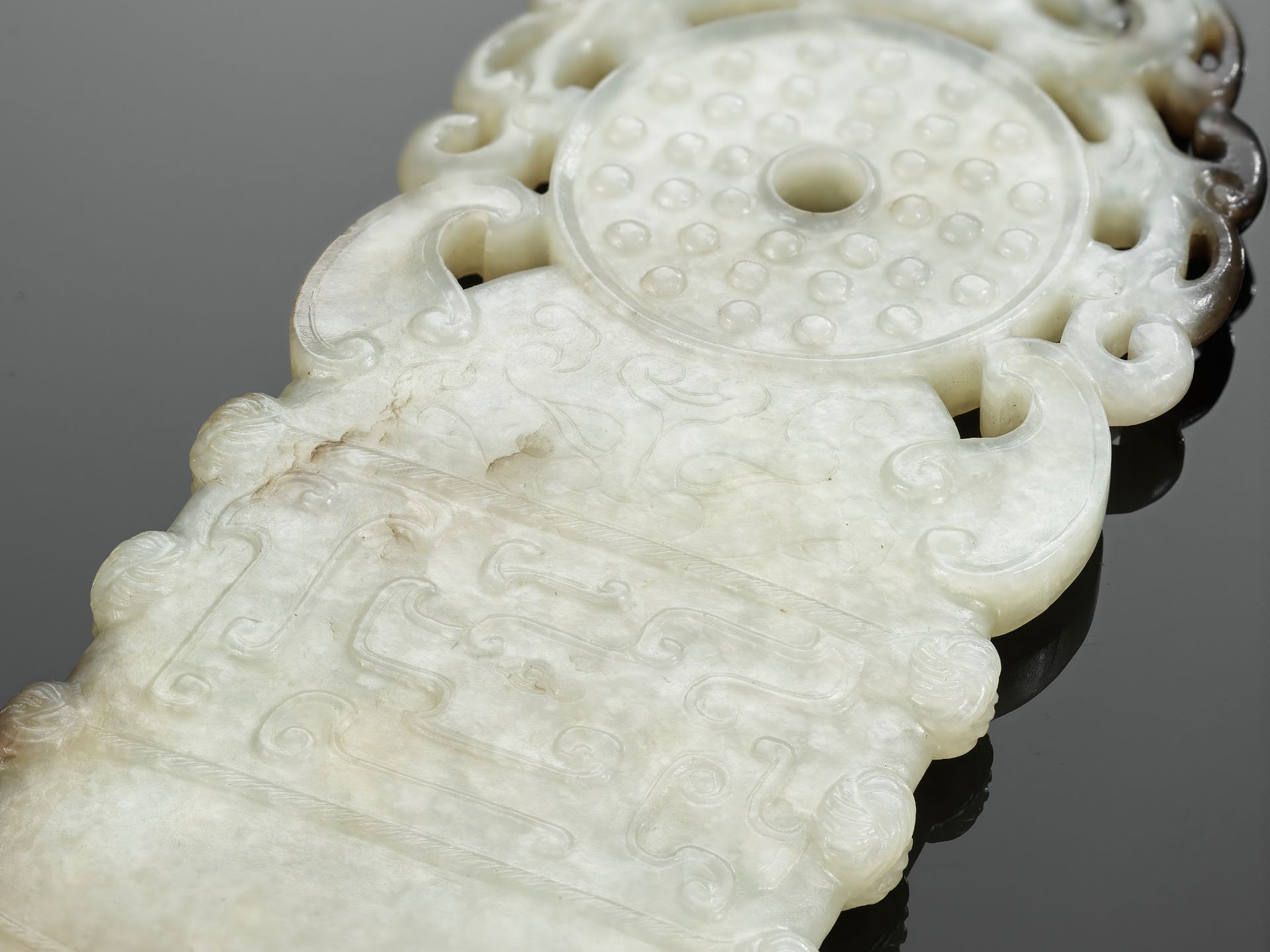 A BLACK AND WHITE JADE 'ARCHAISTIC' AXE-FORM OPENWORK PENDANT, 18TH CENTURY - Image 9 of 9