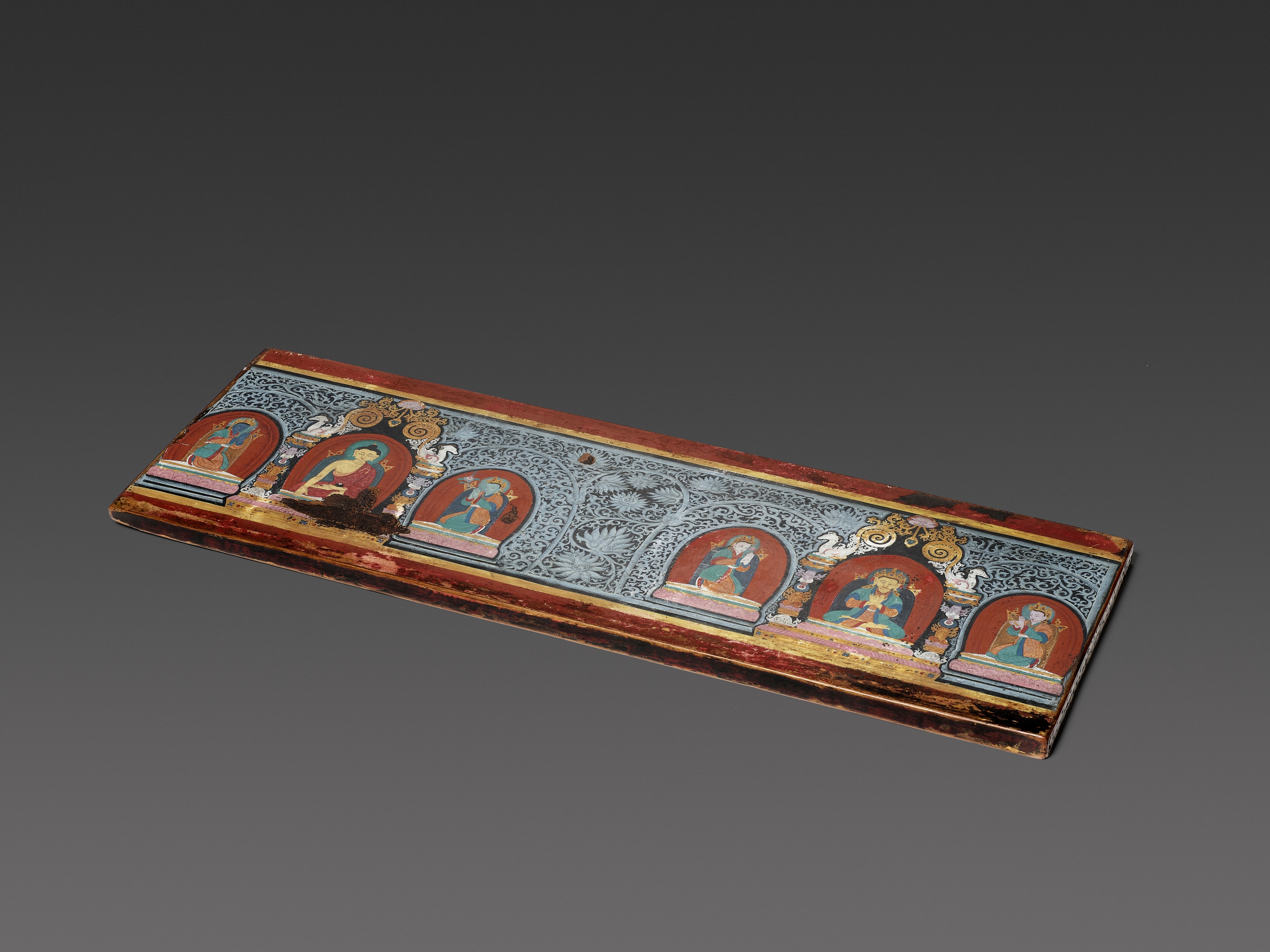 A RARE AND VERY LARGE PAINTED WOOD SUTRA COVER, NEPAL, CIRCA 1450 - Image 6 of 8