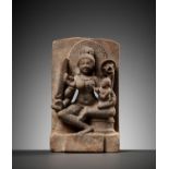 A RARE SANDSTONE MINATURE STELE FIGURE OF A MOTHER GODDESS WITH CHILD