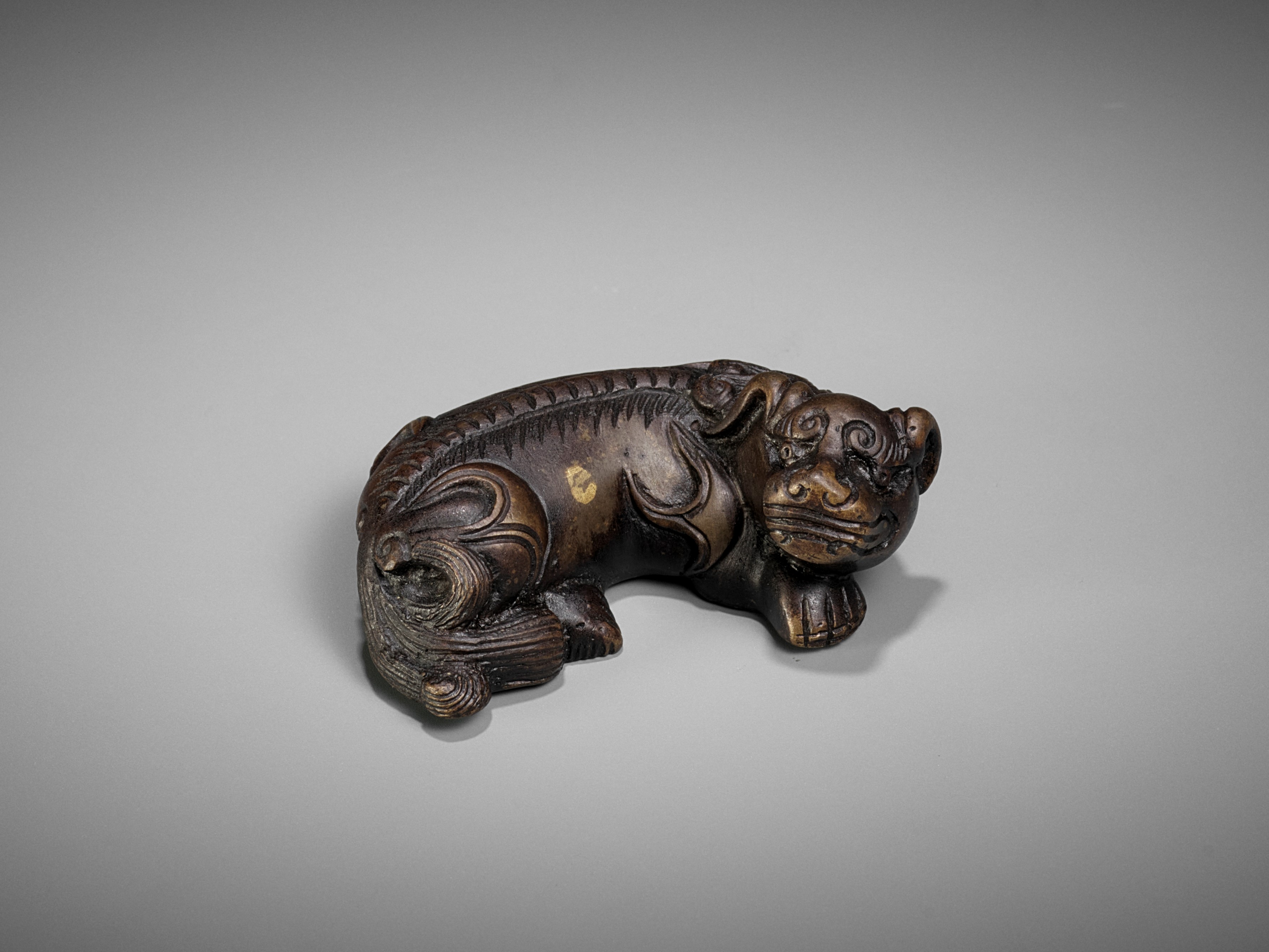 A BRONZE 'BUDDHIST LION' WEIGHT, MING DYNASTY