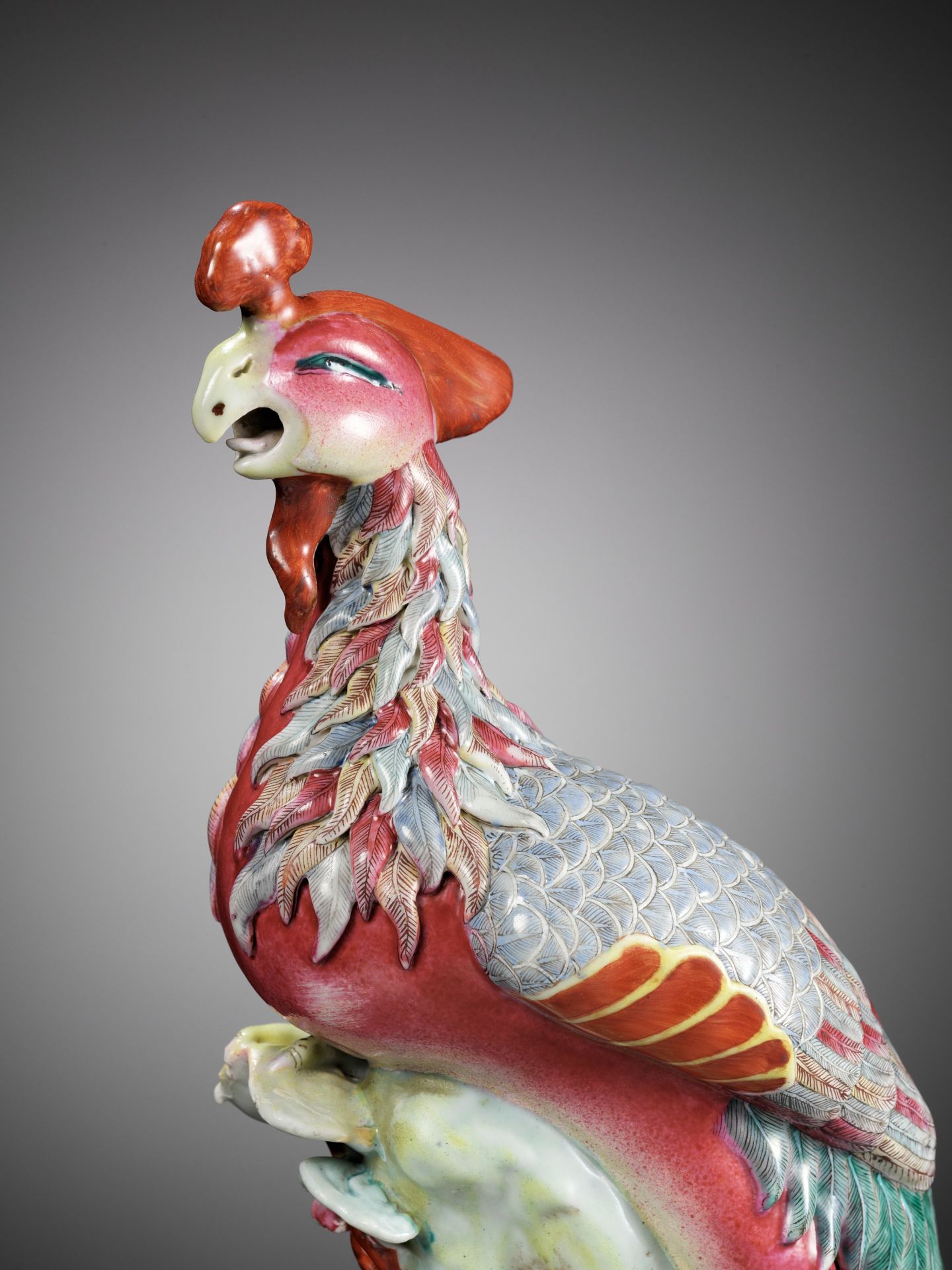 A FAMILLE ROSE FIGURE OF A PHOENIX, 19TH CENTURY