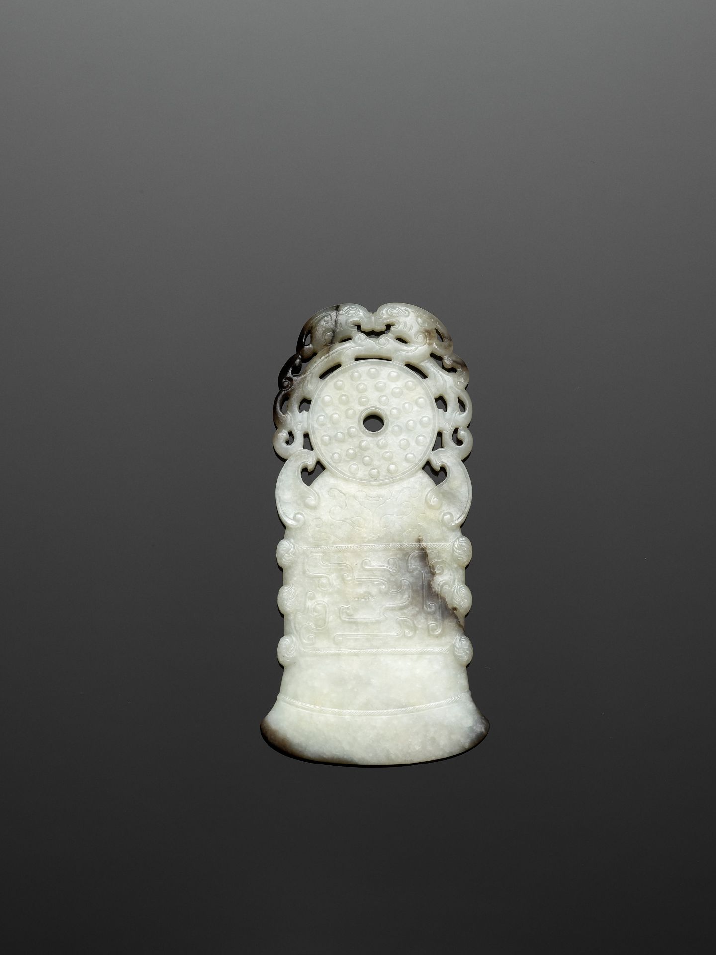 A BLACK AND WHITE JADE 'ARCHAISTIC' AXE-FORM OPENWORK PENDANT, 18TH CENTURY - Image 3 of 9
