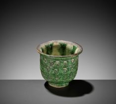 A RARE GREEN-GLAZED BELL-SHAPED CUP, TANG DYNASTY