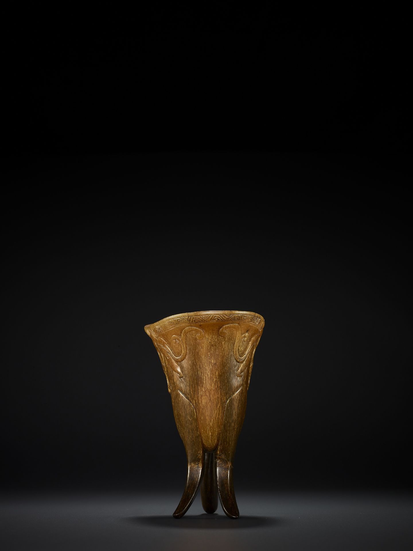 A RHINOCEROS HORN ARCHAISTIC LIBATION CUP, JUE, EARLY QING DYNASTY - Image 9 of 11