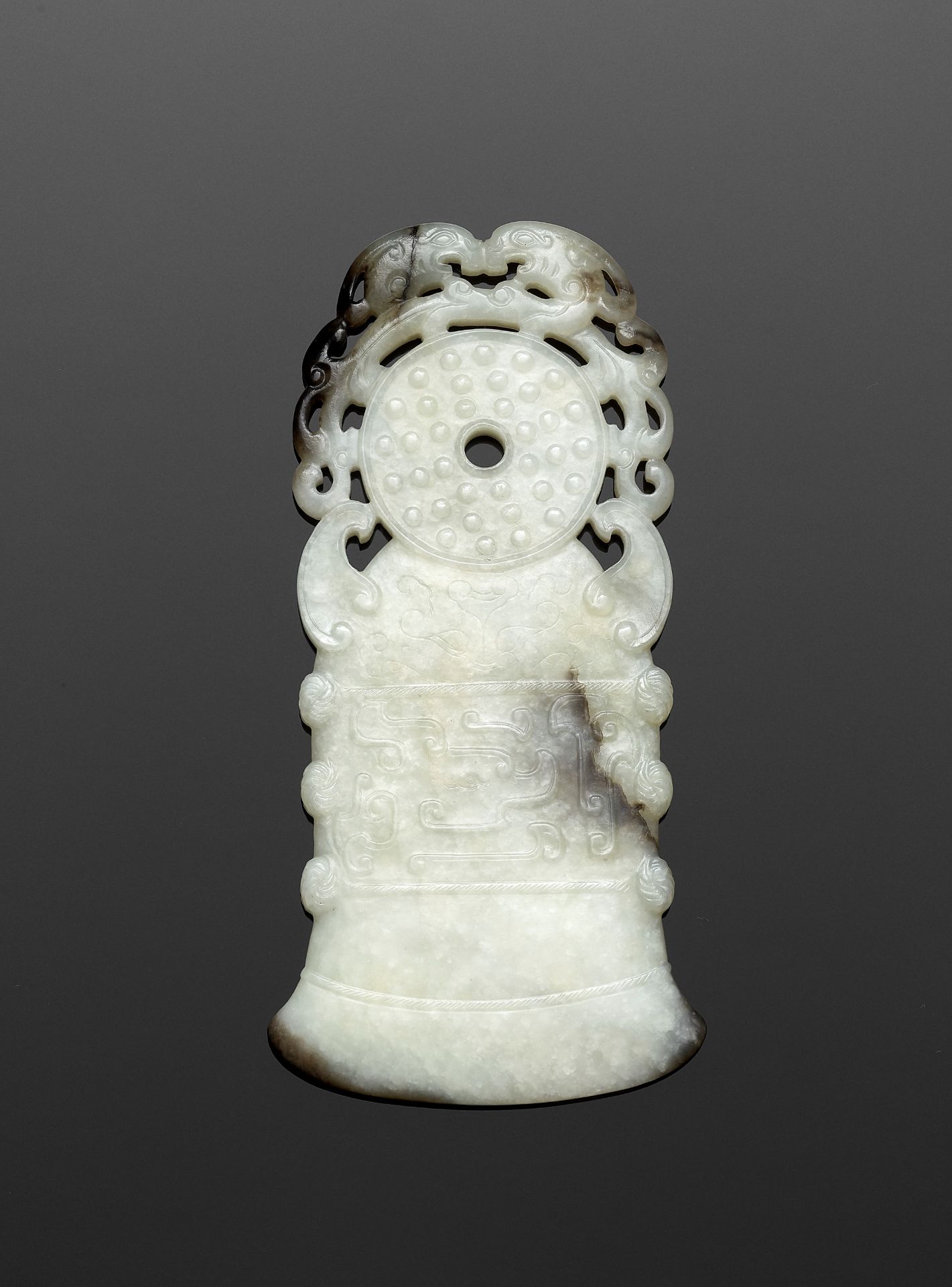 A BLACK AND WHITE JADE 'ARCHAISTIC' AXE-FORM OPENWORK PENDANT, 18TH CENTURY