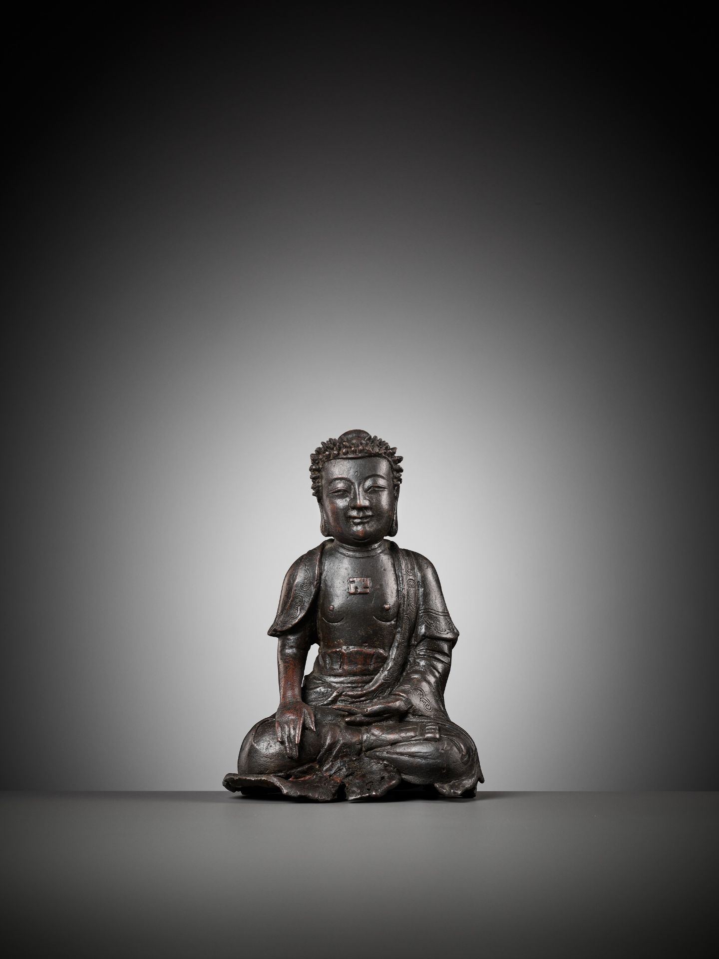 A RARE BRONZE FIGURE OF BUDDHA SHAKYAMUNI WITH WAN SYMBOL, EARLY MING DYNASTY - Image 2 of 10