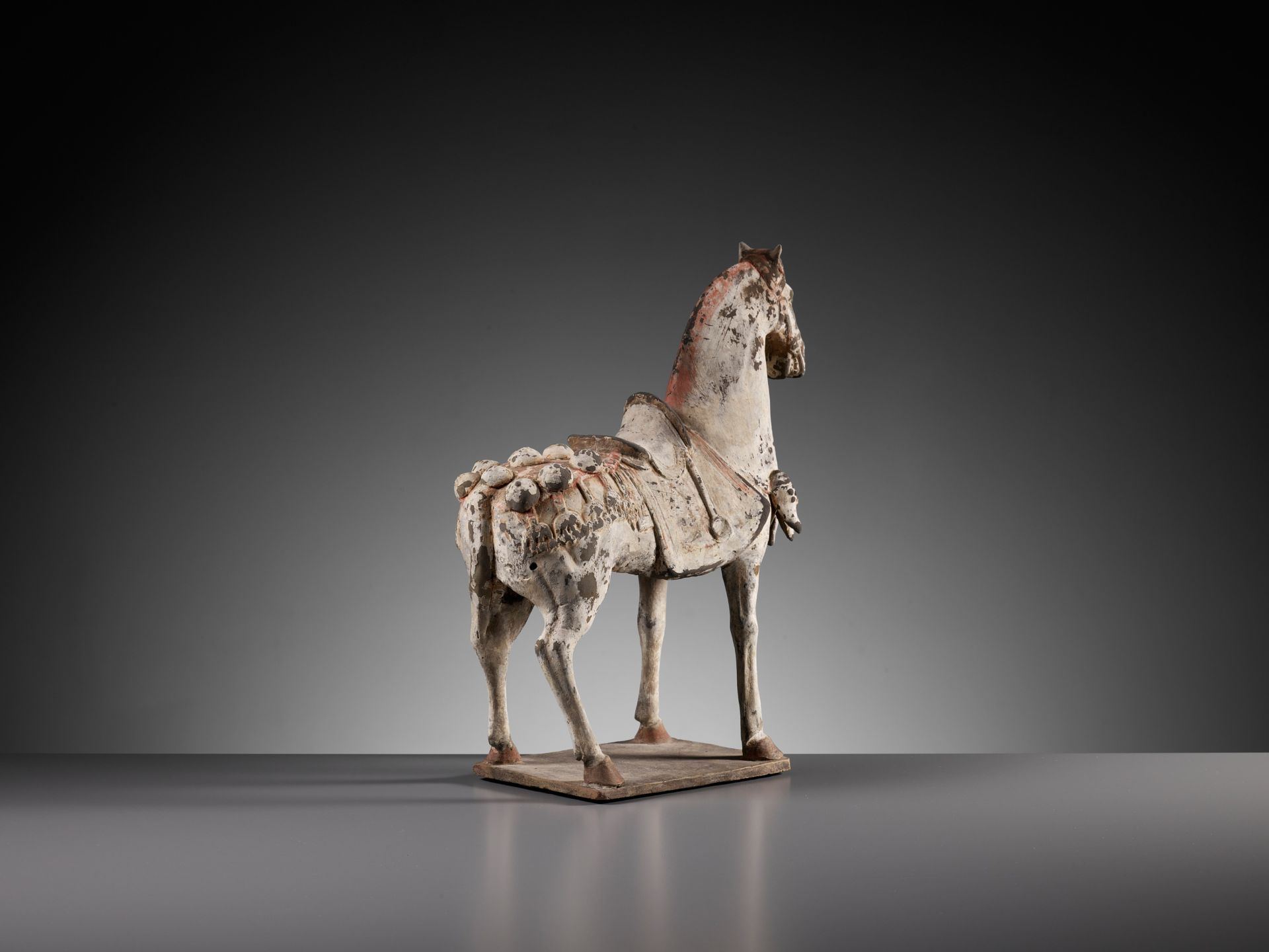 A PAINTED POTTERY FIGURE OF A CAPARISONED HORSE, EASTERN WEI DYNASTY - Image 7 of 9