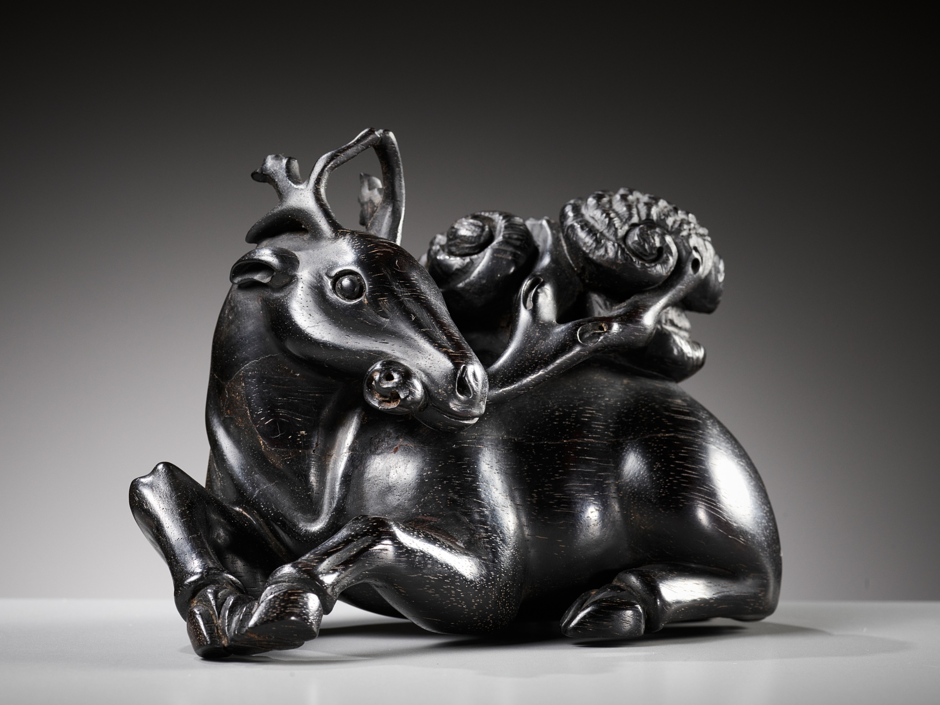 A ZITAN FIGURE OF A DEER HOLDING LINGZHI, 18TH CENTURY - Image 2 of 11