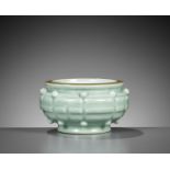 A CELADON GLAZED BAGUA CENSER, EARLY QING DYNASTY