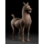 A MONUMENTAL SICHUAN POTTERY FIGURE OF A HORSE, HAN DYNASTY