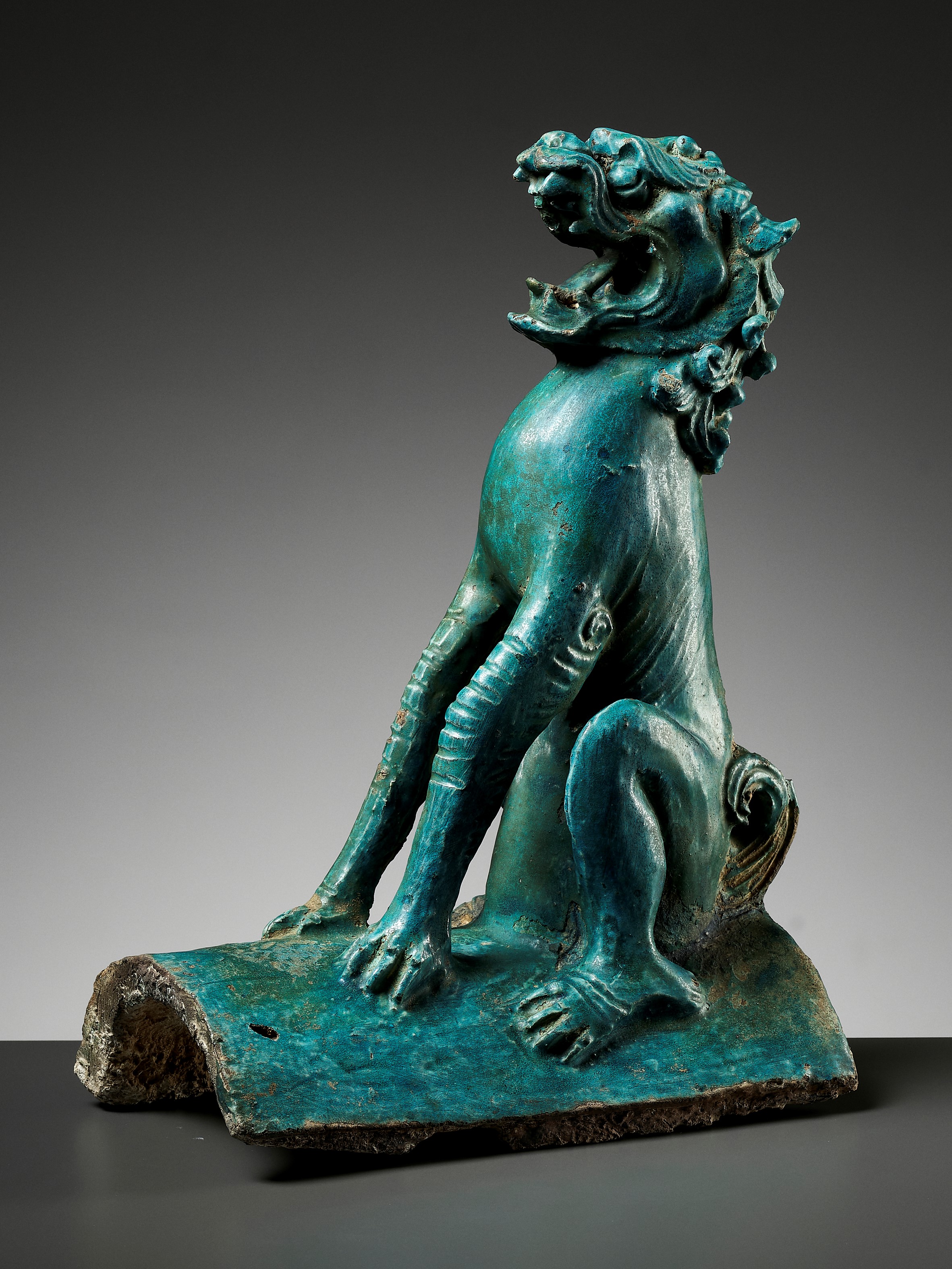 A TURQUOISE-GLAZED 'LION' ROOF TILE, MING DYNASTY