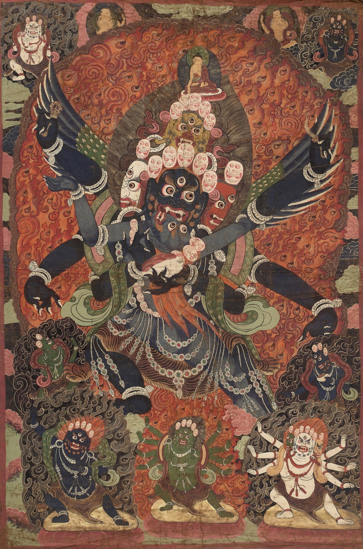 A VERY LARGE THANGKA OF A HERUKA AND CONSORT, TIBET, 18TH-19TH CENTURY