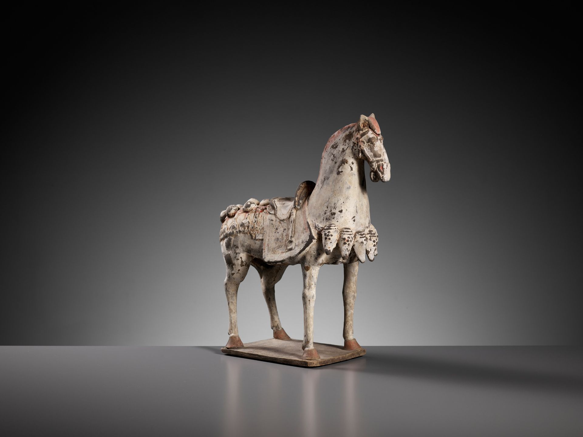 A PAINTED POTTERY FIGURE OF A CAPARISONED HORSE, EASTERN WEI DYNASTY - Image 8 of 9