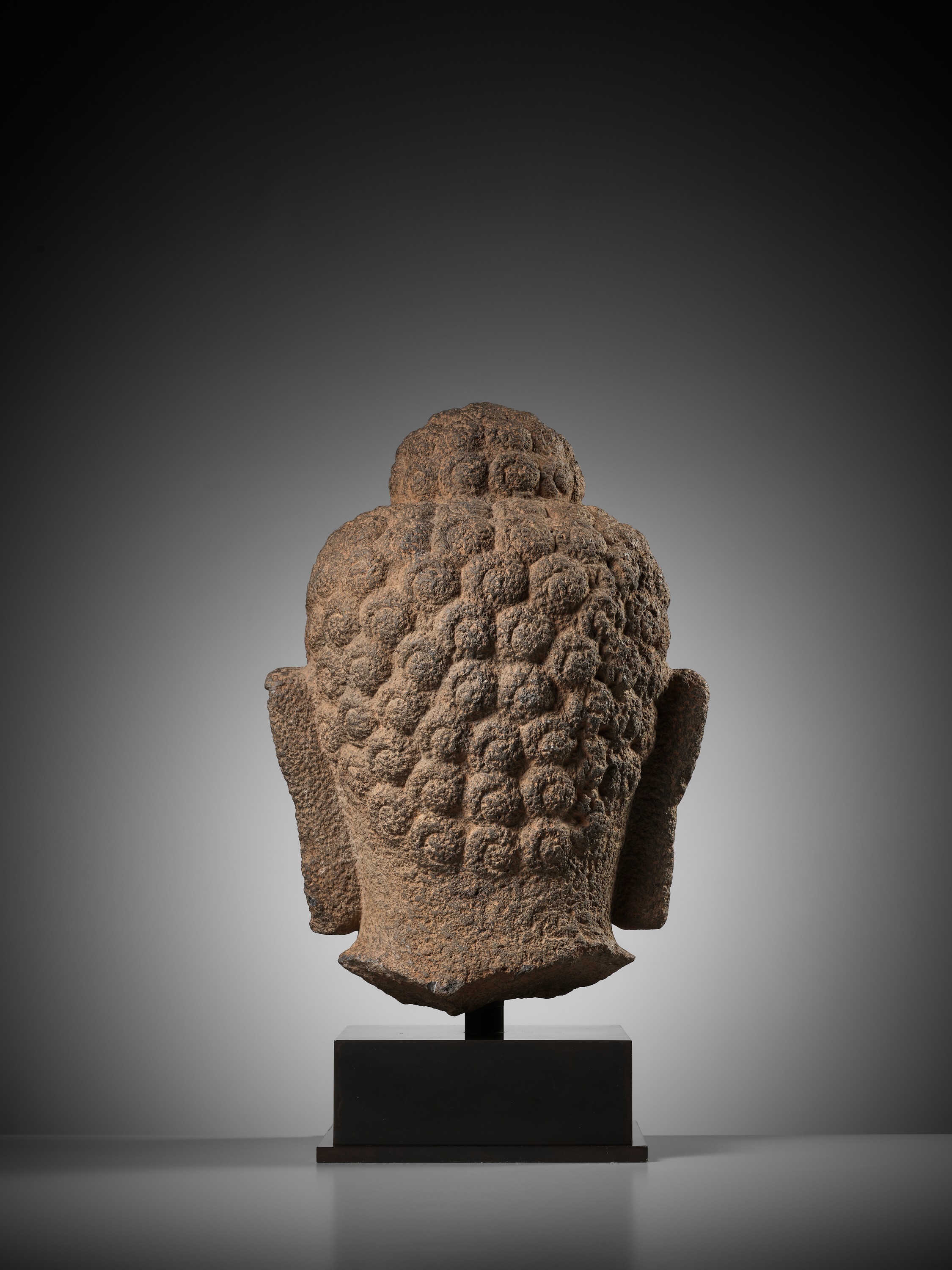 A LARGE ANDESITE HEAD OF BUDDHA, INDONESIA, CENTRAL JAVA, 9TH CENTURY - Image 10 of 10