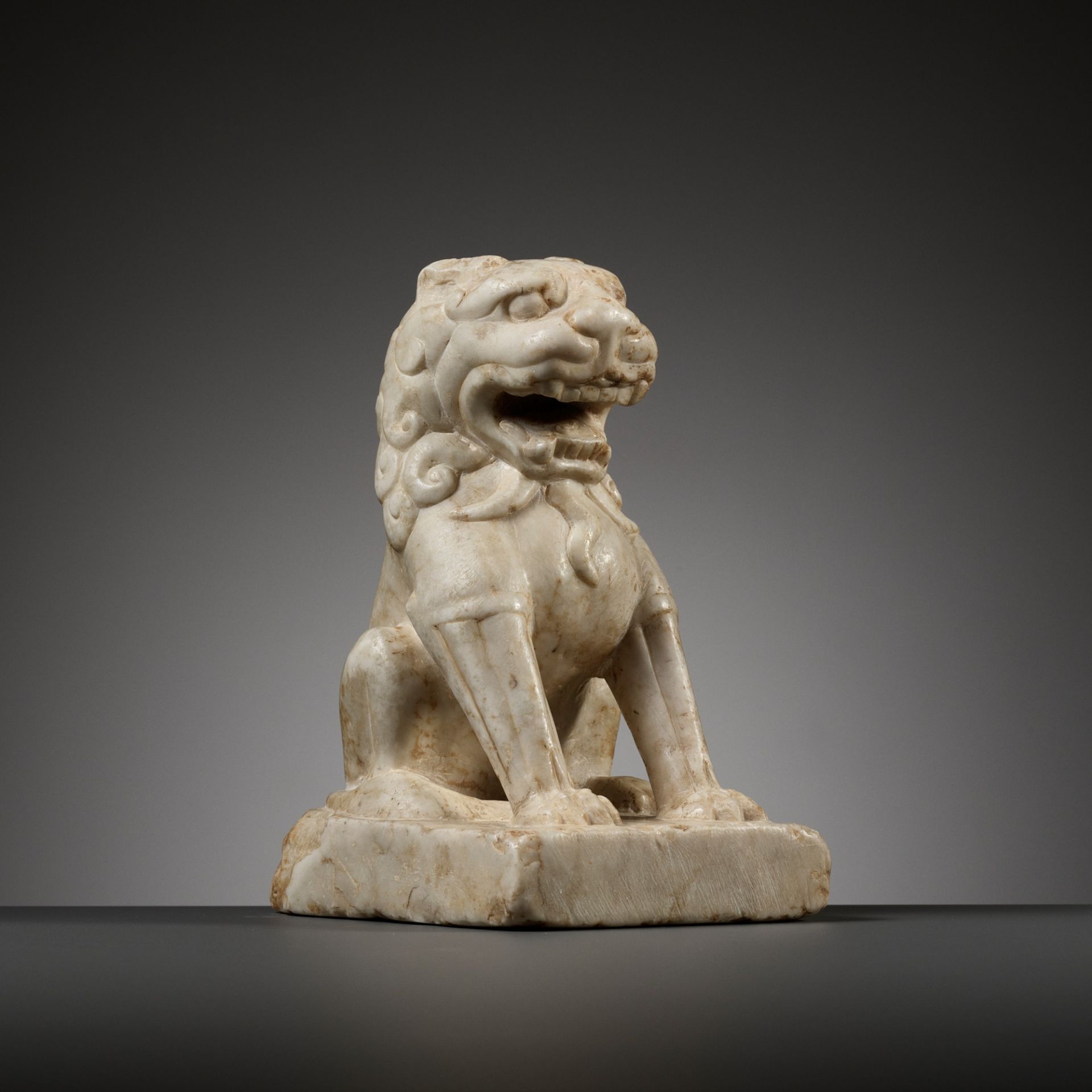 A SMALL WHITE MARBLE FIGURE OF A LION, TANG DYNASTY