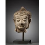A HARIPUNJAYA STUCCO HEAD OF BUDDHA, THAILAND, 11TH-13TH CENTURY