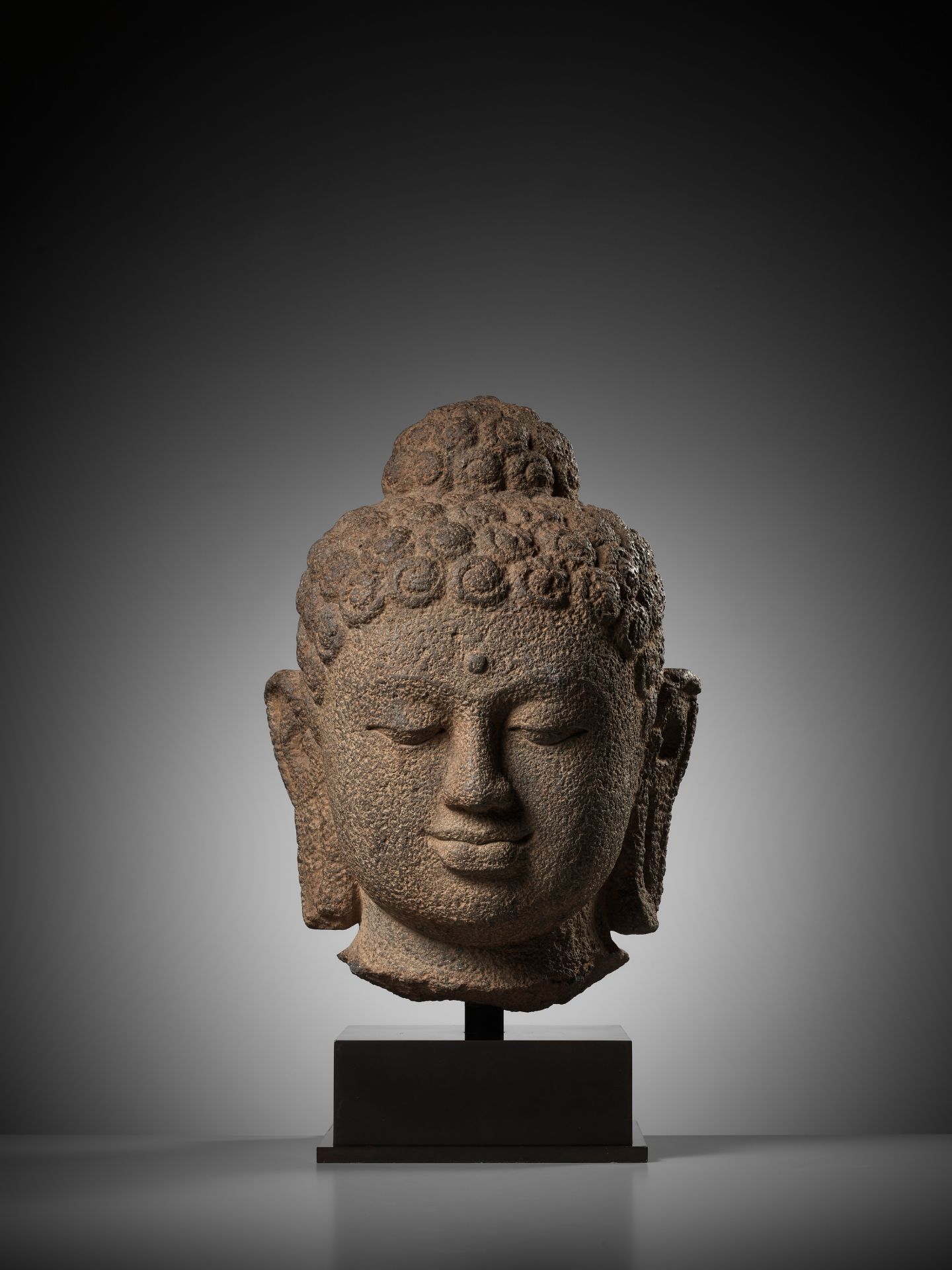 A LARGE ANDESITE HEAD OF BUDDHA, INDONESIA, CENTRAL JAVA, 9TH CENTURY - Image 2 of 10