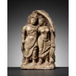 A RARE 'NOBLE COUPLE UNDER ARCH' STUCCO RELIEF, ANCIENT REGION OF GANDHARA