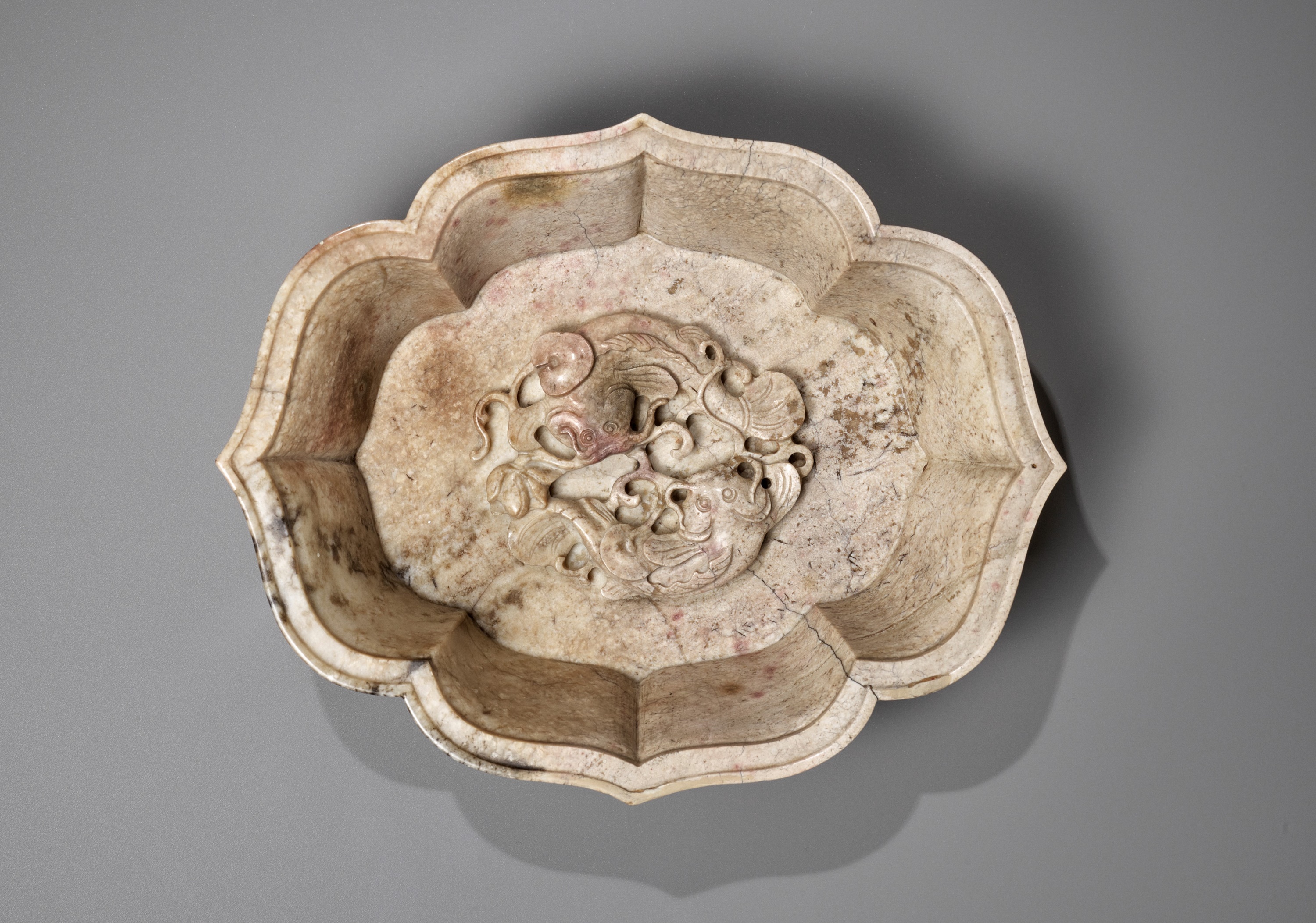 A CHICKEN BONE JADE 'DOUBLE FISH' MARRIAGE BOWL, 17TH-18TH CENTURY