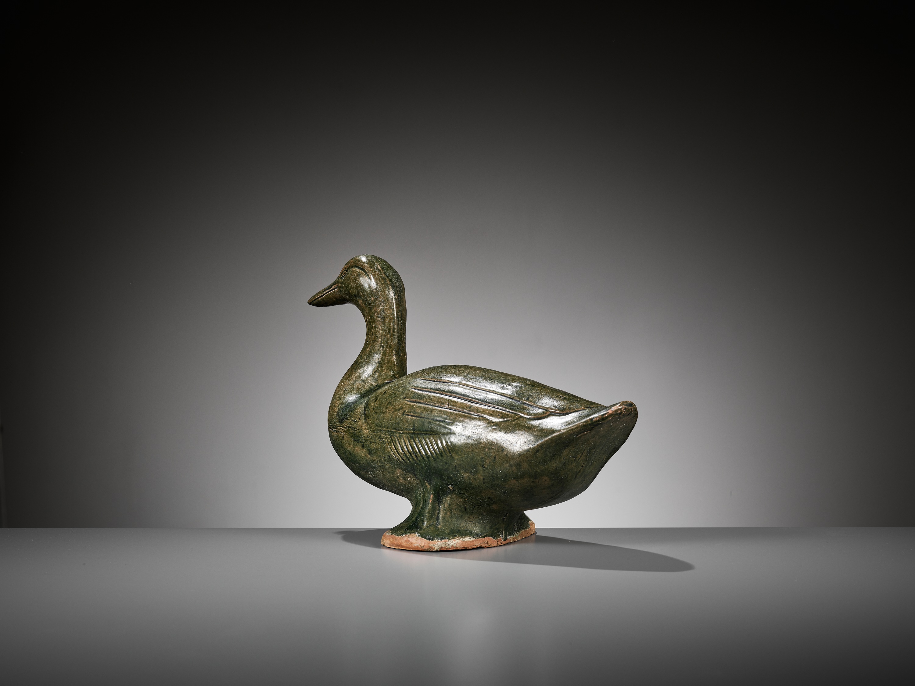 A GREEN GLAZED POTTERY FIGURE OF A DUCK, HAN DYNASTY - Image 7 of 9