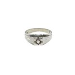 White gold men's ring with small central diamond