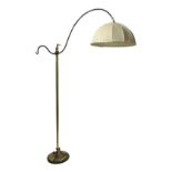 Floor lamp with structure in golden brass and black lacquered metal