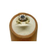 Yellow gold ring with sapphire and diamonds