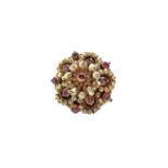 Brooch with beads and rubies in red gold