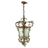 One light chandelier in gilded metal in the shape of a lantern