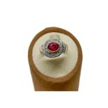 Ring in yellow and white gold, central ruby and crown of diamonds
