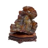 Carnelian sculpture with figure in the central part