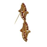 Red gold brooch with rubies, 70's
