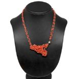 Coral and silver necklace depicting Sicily