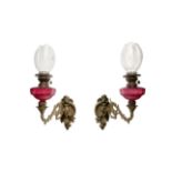 Pair of oil appliques in bronze and magenta glass, Late 19th century