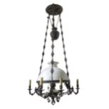 Brass chandelier with opaline glass cup.